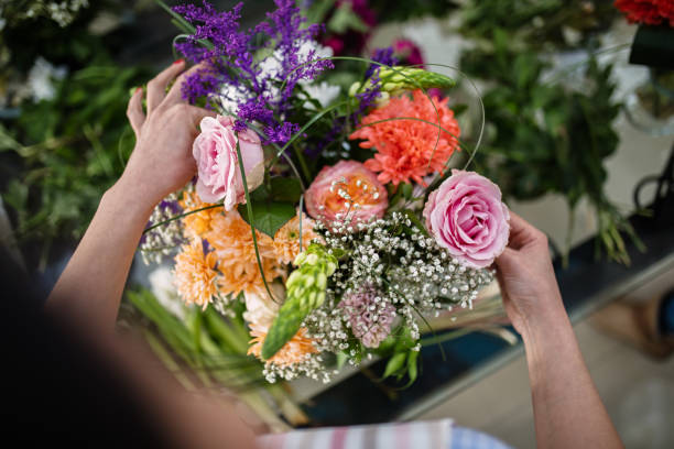 istock Woman making floral decorations 1391469966