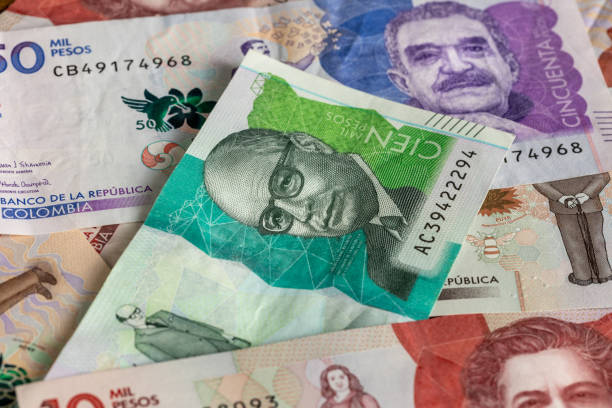 Colombia money, Colombian pesos scattered on the table, Paper banknotes Colombia money, Colombian pesos scattered on the table, Paper banknotes colombian peso stock pictures, royalty-free photos & images