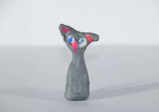 Plasticine cat. Plasticine toy on a white background.