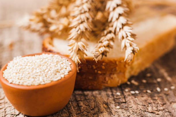 Bread isolated on wooden background.