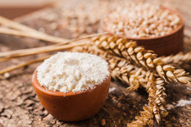 istock Fresh wheat grains and flour. 1391475567