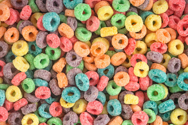 istock Delicious and nutritious fruit cereal loops as background. Healthy breakfast. 1391476710