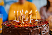 Birthday cake with lighted candles