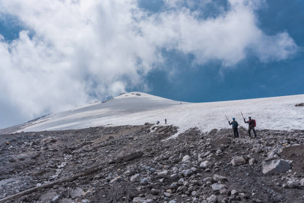 istock two mountaineers walking on the ice 1391481703