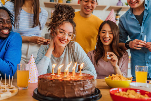 istock Young woman celebrating a birthday 1391482370