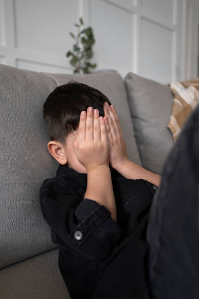 istock Sad child at home 1391483511
