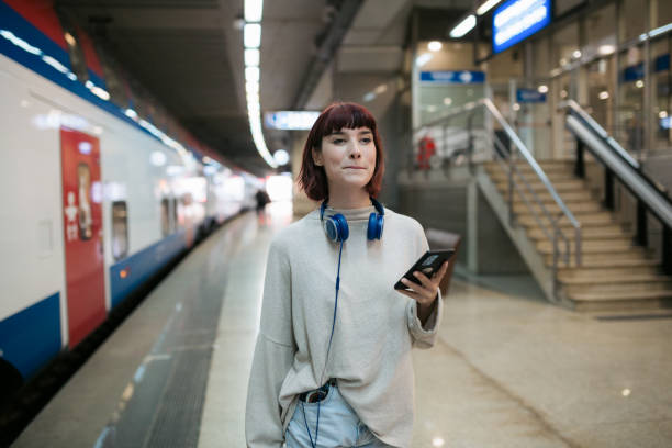 istock Young Caucasian woman traveling using a subway 1391483557