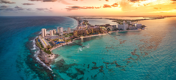 sunset on a Cancun resort with blue water