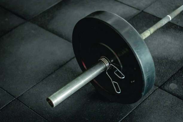 istock training in the gym weights and body weight 1391491586