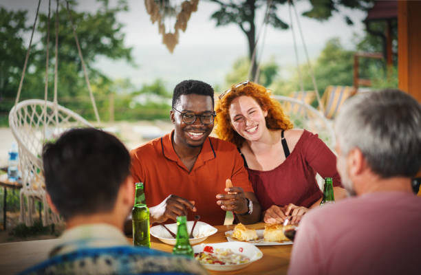 istock Friends having a dinner party. 1391495291