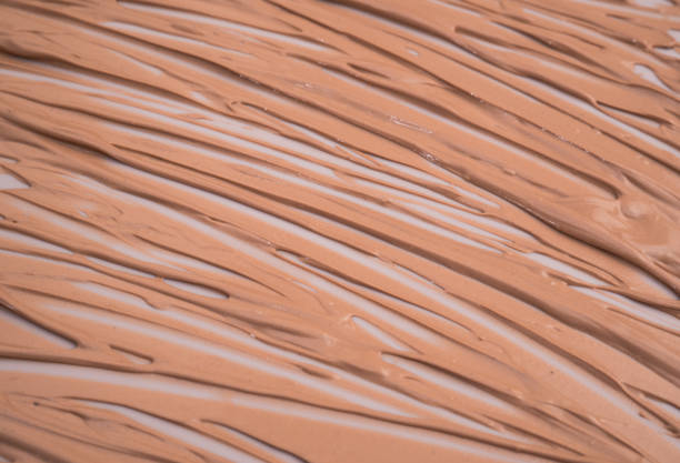 istock Makeup base cream blur, red clay mask texture. Background 1391504751