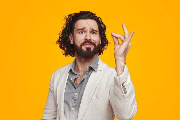 istock Male cook gesturing and looking at camera 1391504866