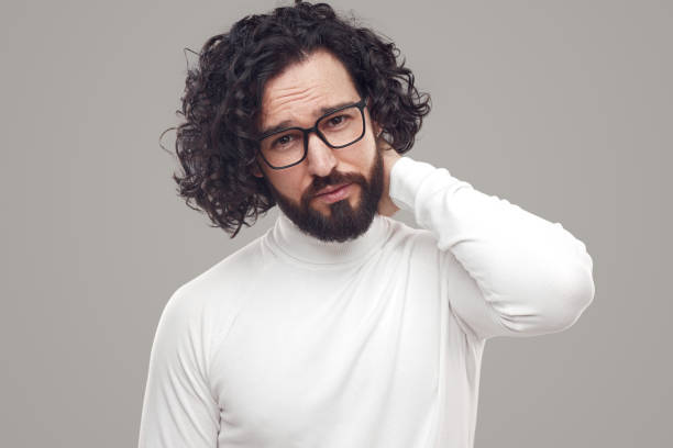 istock Confident bearded man in eyeglasses looking at camera 1391504903