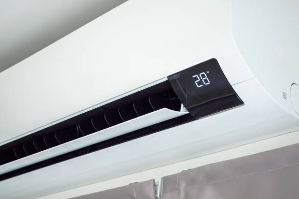 istock Air conditioner on white wall room interior background 1391506234