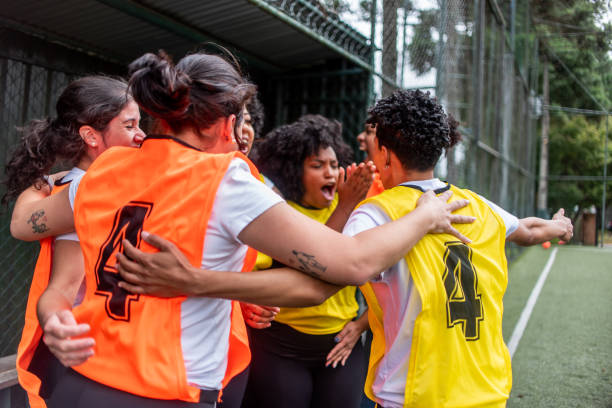 istock Soccer team celebrating goal 1391525579