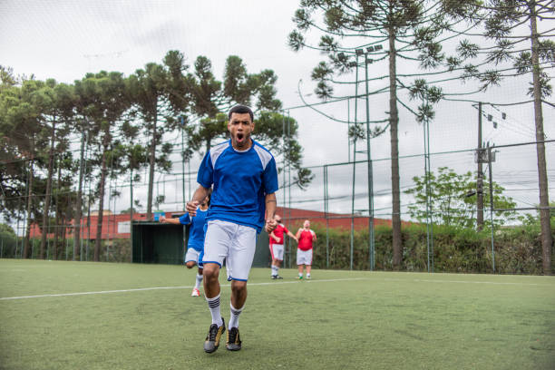 istock Soccer player celebrating goal 1391525772