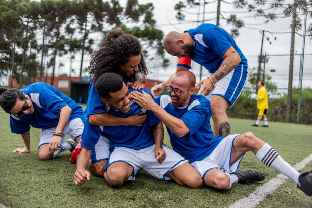 istock Players celebrating a goal 1391525781