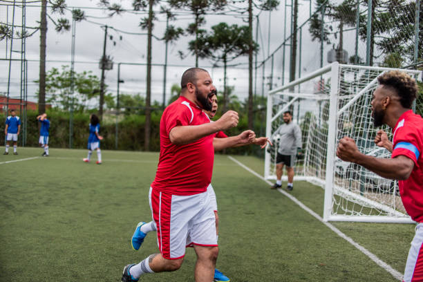 istock Players celebrating a goal 1391525805