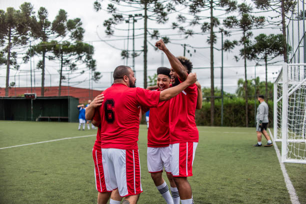 istock Players celebrating a goal 1391525806
