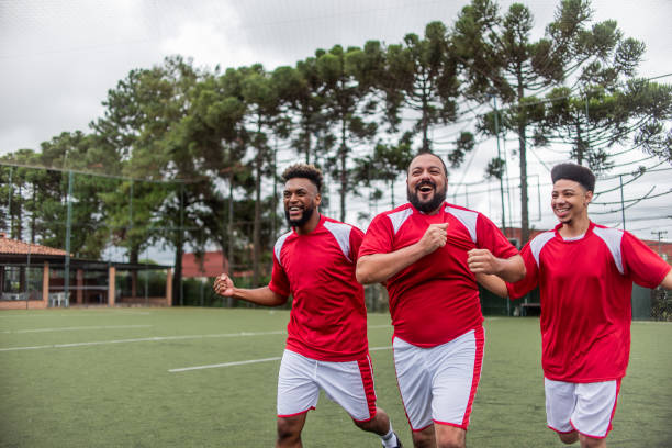 istock Players celebrating a goal 1391525825