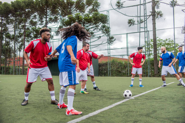 istock Player with down syndrome in free kick 1391525845