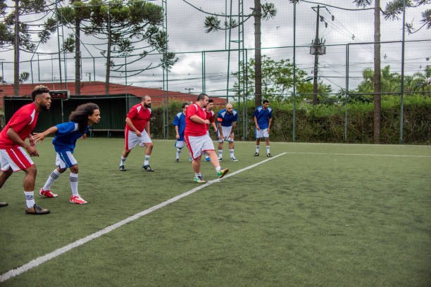 istock Player with down syndrome in free kick 1391525849