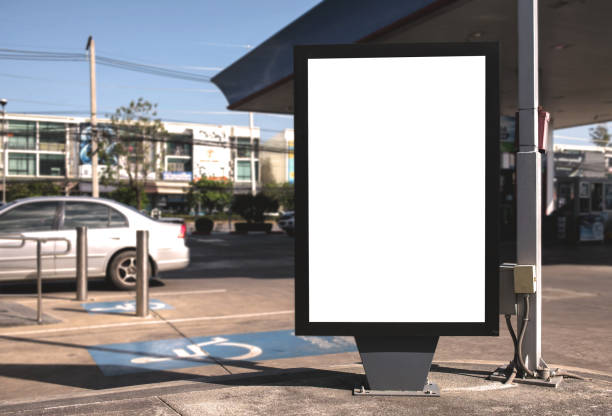 istock Large white blank billboard mockup displayed inside the gas station. 1391527860