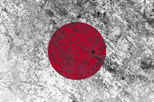 istock Rustic flag of japan painted on a distressed old metal sheet 1391532575