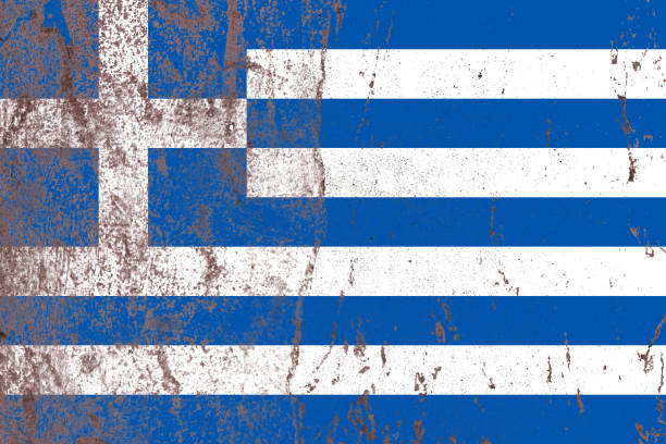 istock Greece flag on a damaged old concrete wall surface 1391532720
