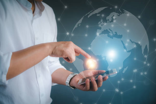 istock hand holding a Earth globle in technology concept. 1391536971