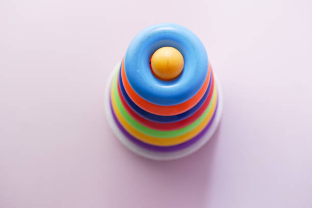 Baby toys on color background. Child development concept
