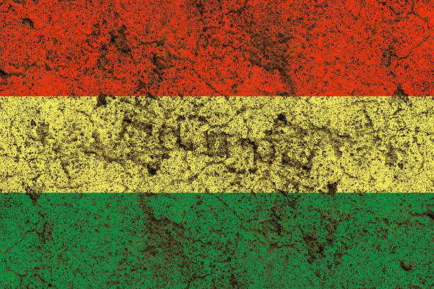 Painted bolivia flag on a distressed old concrete wall surface