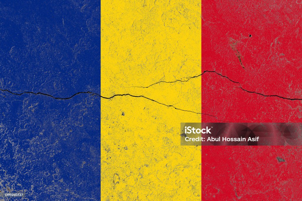Romania flag painted on a cracked old concrete wall Aging Process Stock Photo