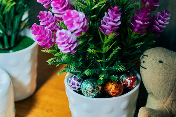 istock Horizontal view of small Easter eggs and decorative flowers. Selective focus. Happy Easter. 1391541839