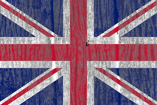 United Kingdom flag painted on a distressed old rustic metal sheet