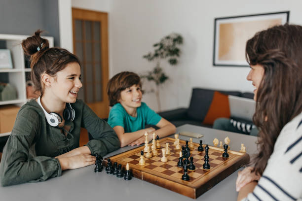 istock Family play chess 1391546309