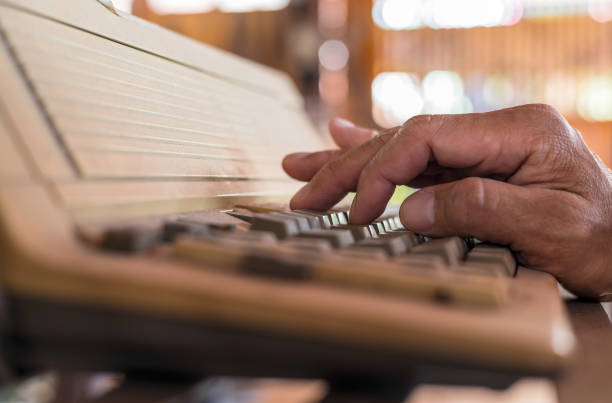 istock Close-up view of one hand resting on the keyboard. 1391548758