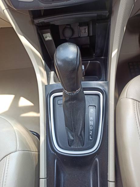 istock Automatic gear stick inside modern sport car. Luxury and expensive concept. 1391553252