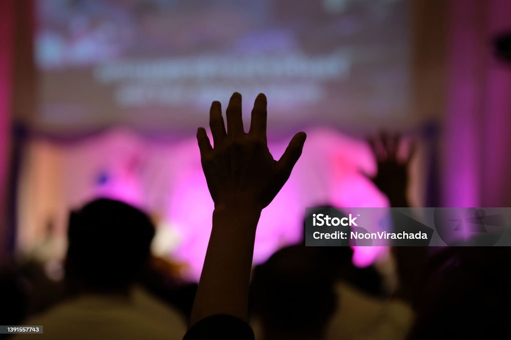 Hand raising concert, Hand raising for religion Silhouette hands Abstract Stock Photo