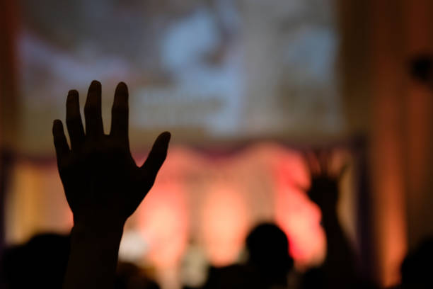 istock Hand raising concert, Hand raising for religion 1391557751