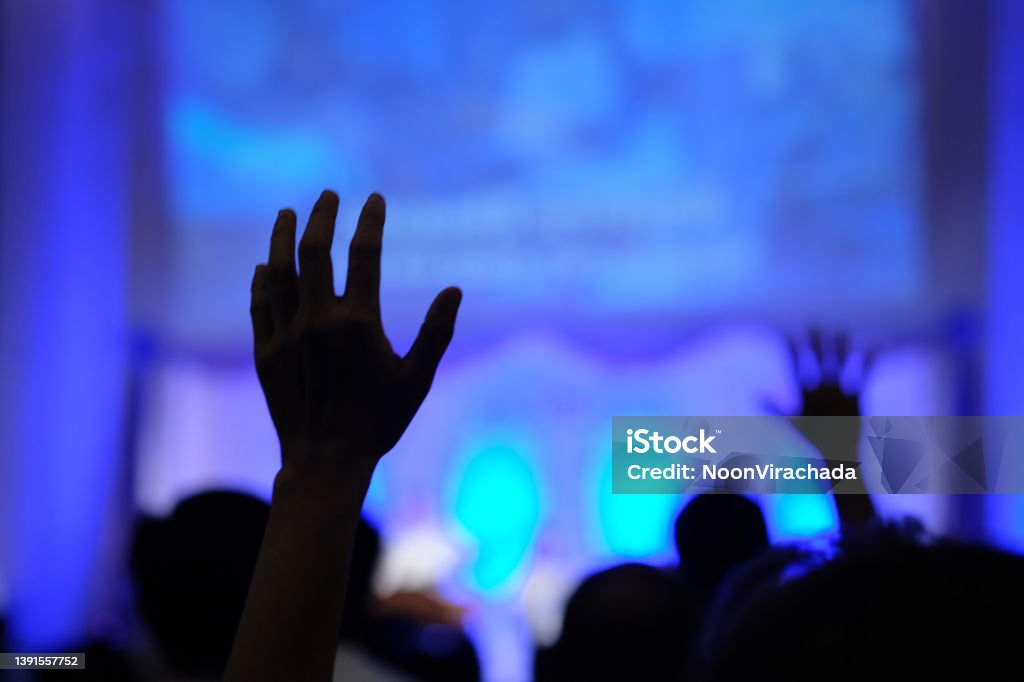 Hand raising concert, Hand raising for religion Silhouette hands Arts Culture and Entertainment Stock Photo
