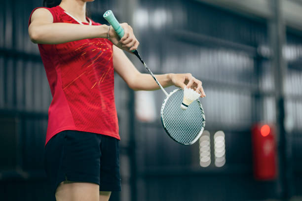 istock Taiwanese badminton players warm up exercise practicing in badminton court endurance training 1391561294