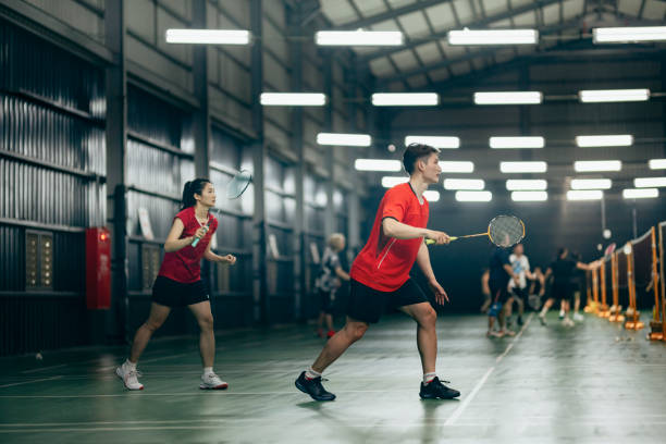 istock Taiwanese badminton players warm up exercise practicing in badminton court endurance training 1391563451