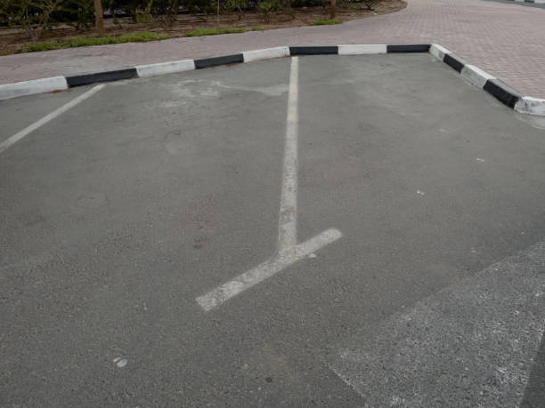 istock Public parking spaces on a street 1391565522