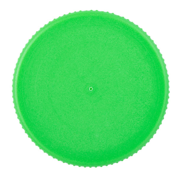 istock Plastic bottle cap isolated on white background. Concept of environmental pollution, eco friendly behavior, waste sorting and plastic recycling. 1391566699
