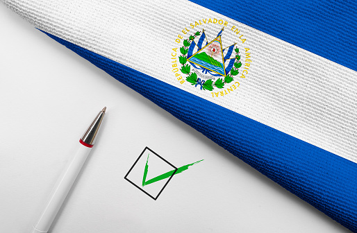 Pencil, Flag of El Salvador and check mark on paper sheet