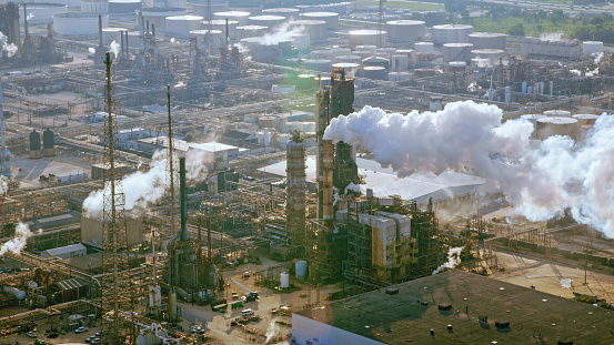 Aerial view of smoke rising out of the oil refinery towers, Houston, Texas, USA.