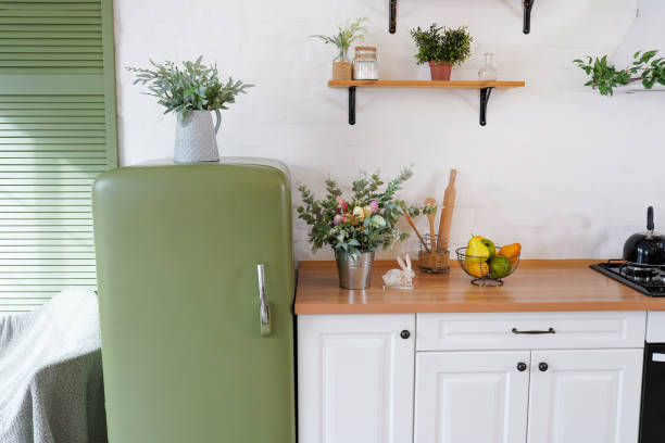 istock Easter eggs, flowers and rabbit on the table In a white Scandinavian-style kitchen. The concept of home comfort and decor in the bright holiday of Easter 1391574461