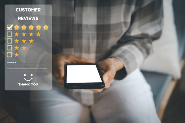 istock Customer service and Satisfaction concept ,Women hand hold smart phone empty screen choose the 5 star icon to give satisfaction in service. rating very impressed in coffeeshop. 1391575761
