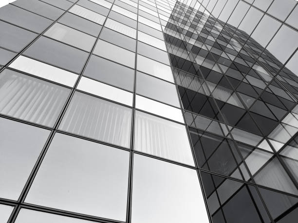 istock Tall building with reflection on window glass 1391578781